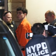 Alleged Midtown assassin Luigi Mangione escorted into car following extradition hearing