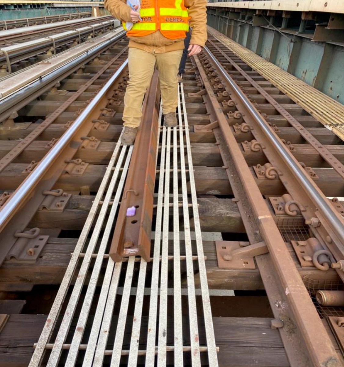 obstruction on emergency exit walkway on elevated subway line