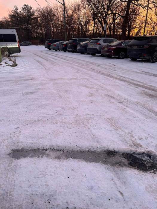 a parking lot on Staten Island that is icy