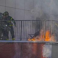 Firefighters in Chinatown battle flames