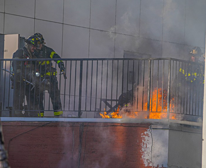 Firefighters in Chinatown battle flames