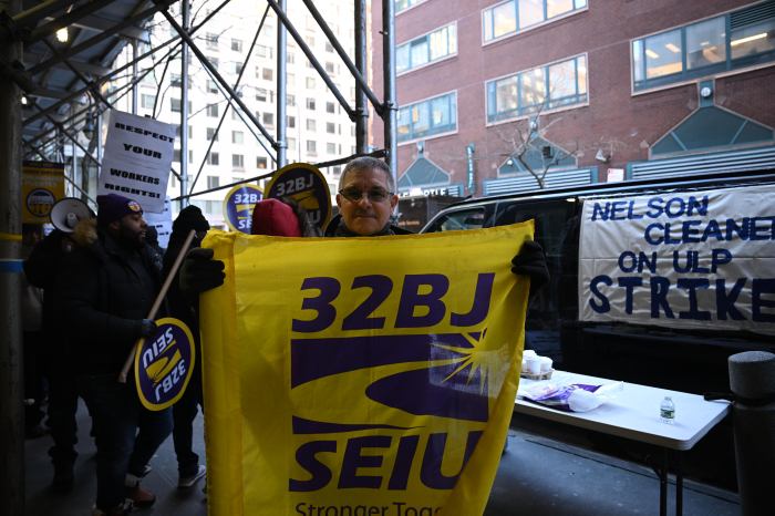 32 BJ SEIU Denis Johnston supports his worker striking against unfair labor at Con Edison.