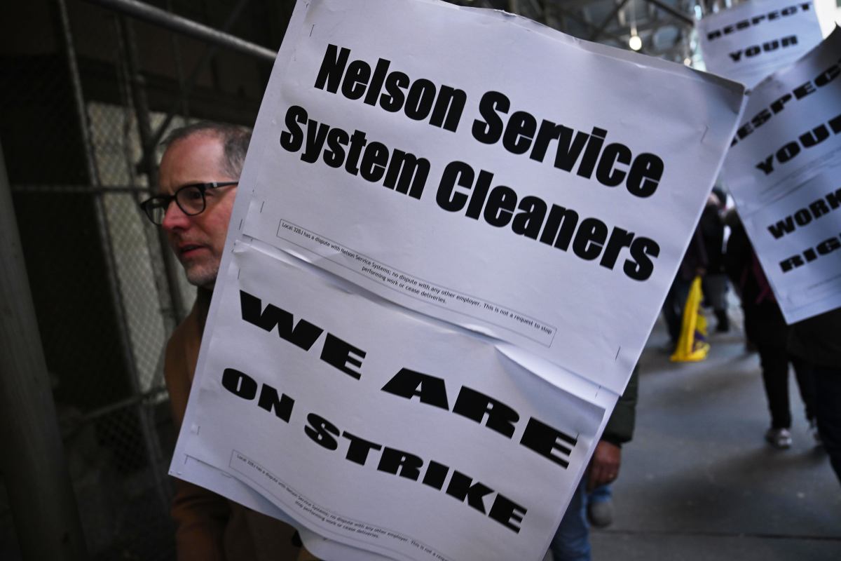 Nelson Service System Cleaner, contracted with Con Edison, officially went on strike outside of 4 Irving Place.