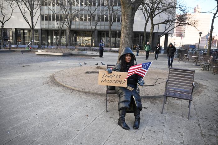 A faithful fan claims Trump's innocence in front of the Manhattan courthouse as he was handed his sentencing.