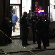 Officers from Brooklyn's 75th Precinct investigate their first shooting of 2025 on Wednesday night, Jan. 1, that left a man wounded in a barber shop on Stanley Avenue in East New York.