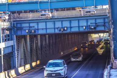 Cars pass under the toll gantries at the Manhattan Bridge amid congestion pricing in New York on Jan. 7, 2025.