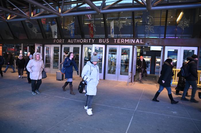 people walking outside port authority bus terminal in NYC in daytime