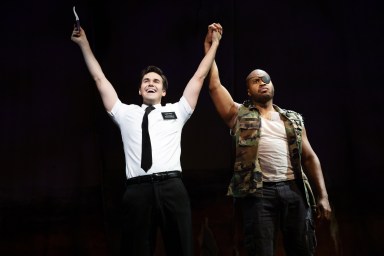 Kevin Clay (Elder Price), Derrick Williams (The General) in The Book of Mormon ©Julieta Cervantes