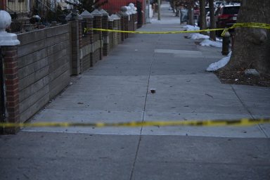 Police tape at scene in Brooklyn where man was stabbed to death