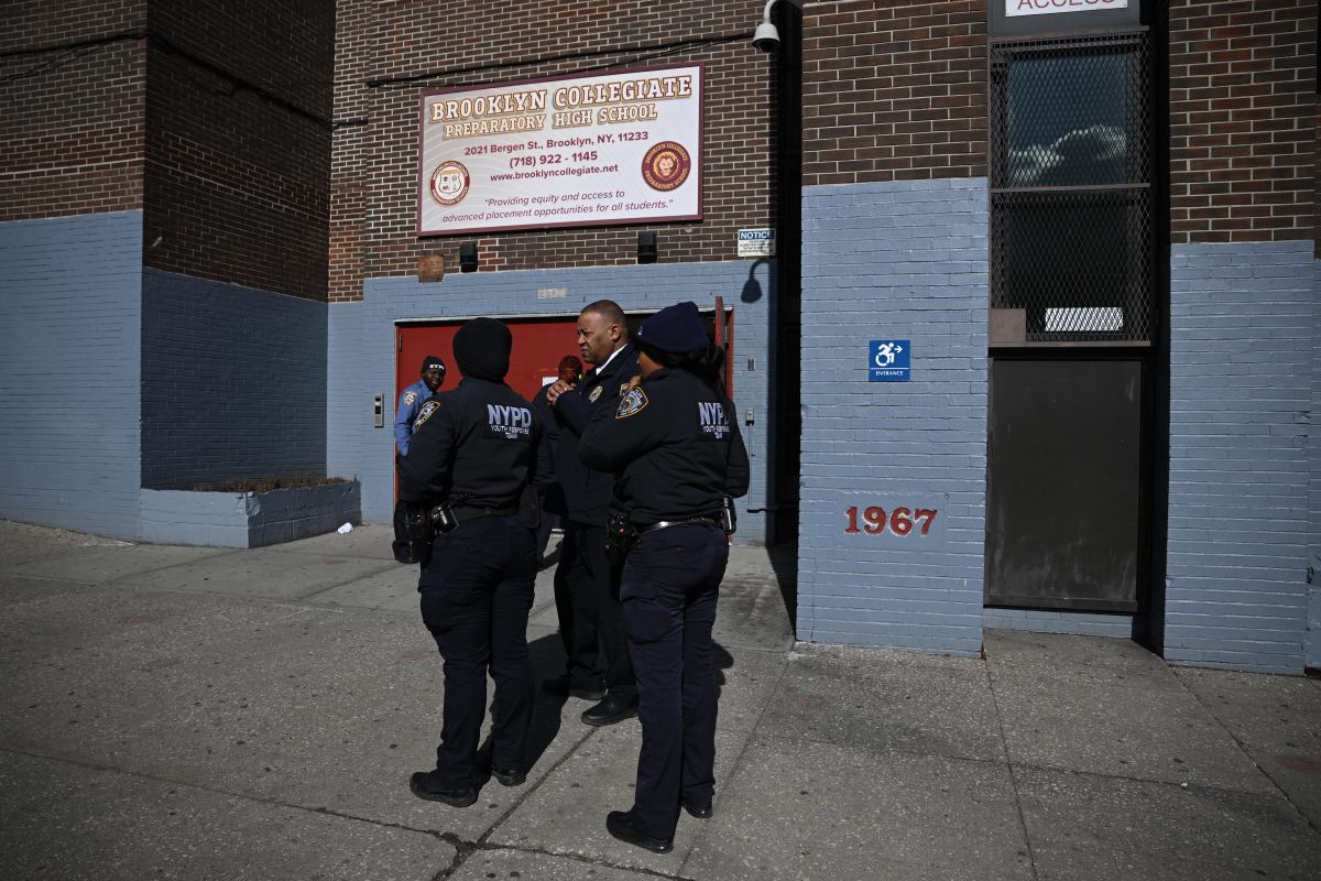 Cops outside Brooklyn school where teen was found shot