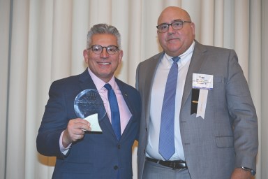 Justice Brian Burns and Chief Administrative Judge Joseph Zayas at NYSBA luncheon