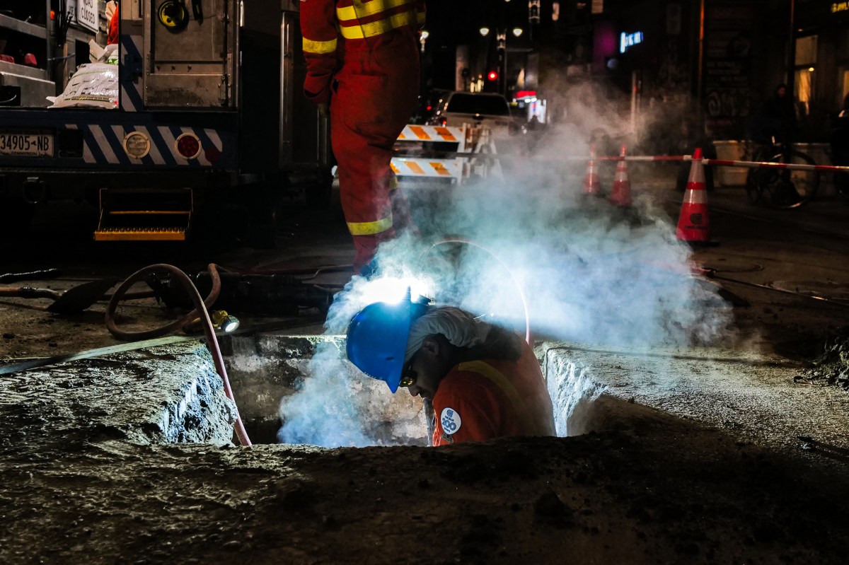 Con Edison worker toiling in manhole