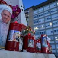 Candles with Pope Francis' image outside Rome hospital