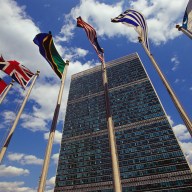 Flags fly outside the General Secretariat Building at the United Nations Headquarters.