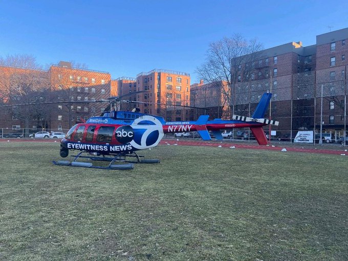 helicopter on a field outside a high school in Queens