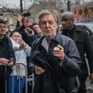 Paul McCartney pointing at cameraman on Lower East Side