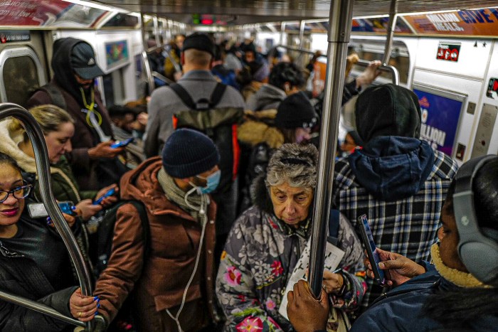 Crowded subway car in congestion pricing era