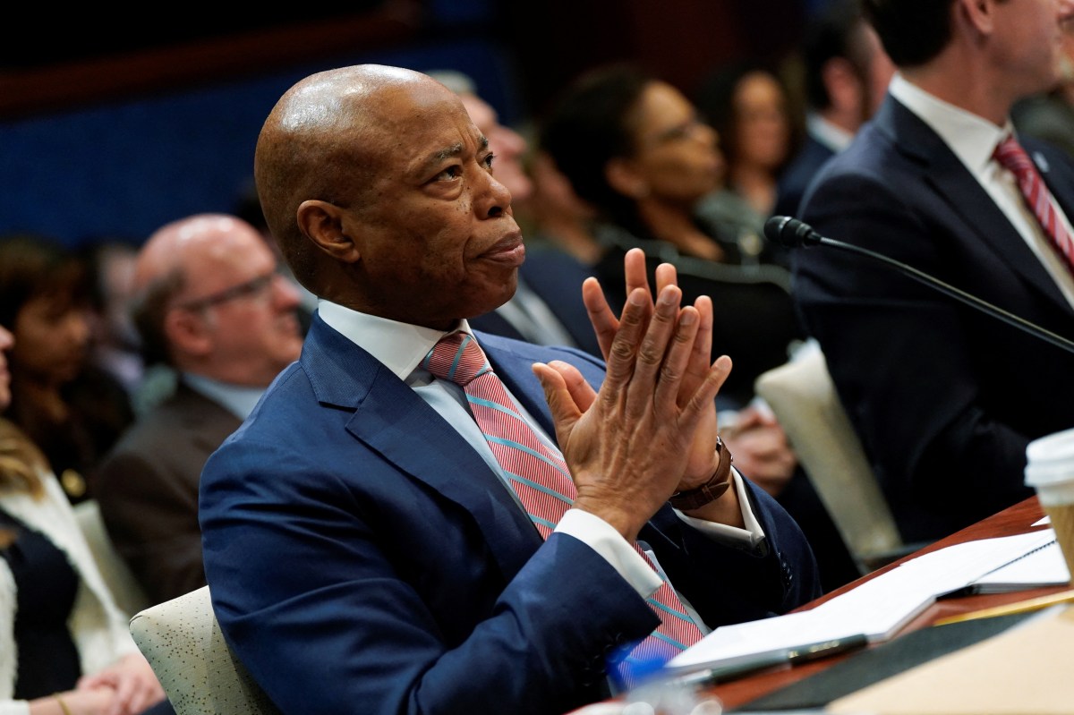 Mayor Adams with hands folded at Congress hearing