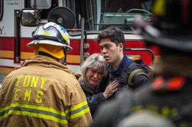 Woman weeps in firefighter's arms after deadly West Village fire