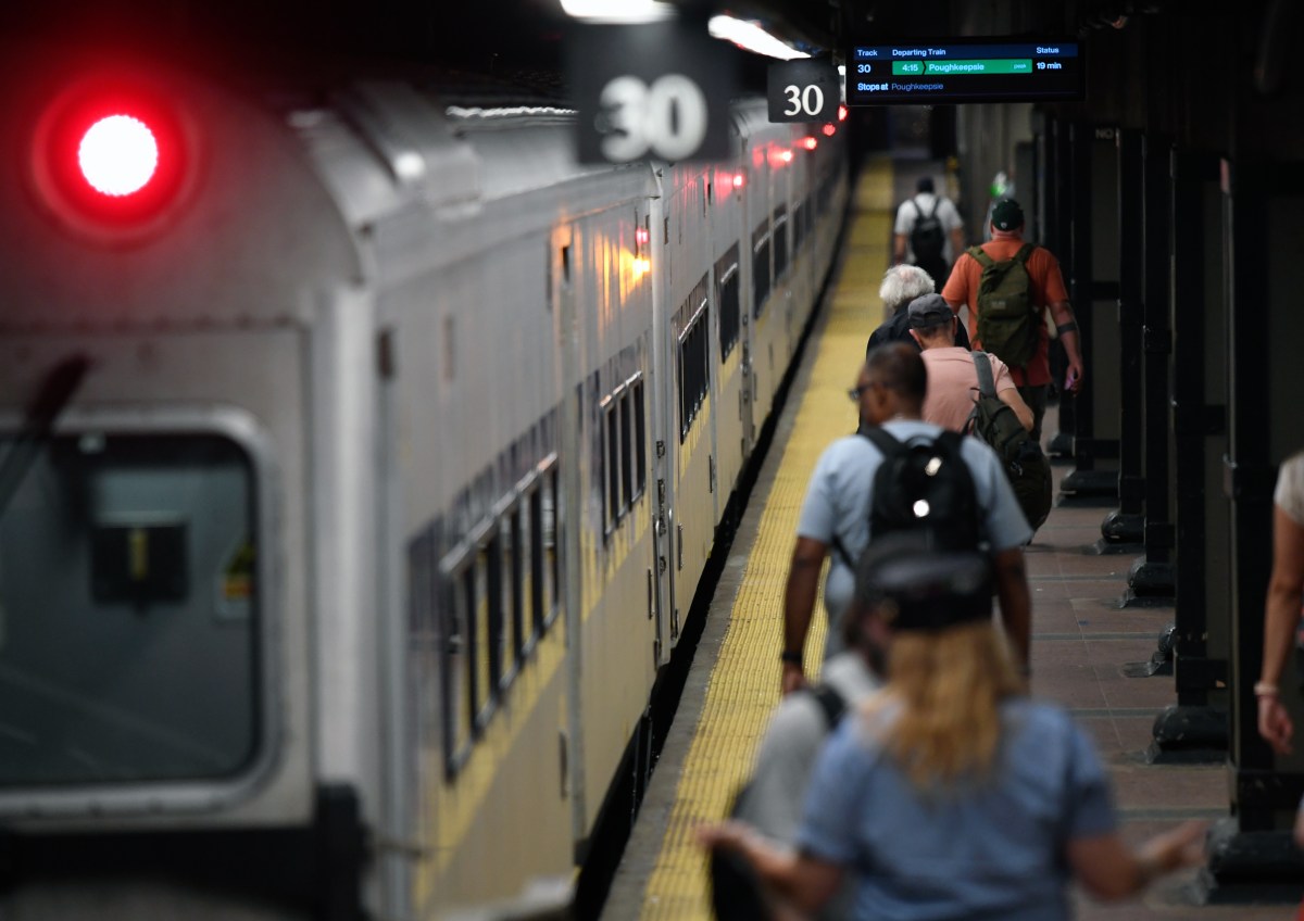 Metro-North commuters on train platform as MTA capital plan awaits approval