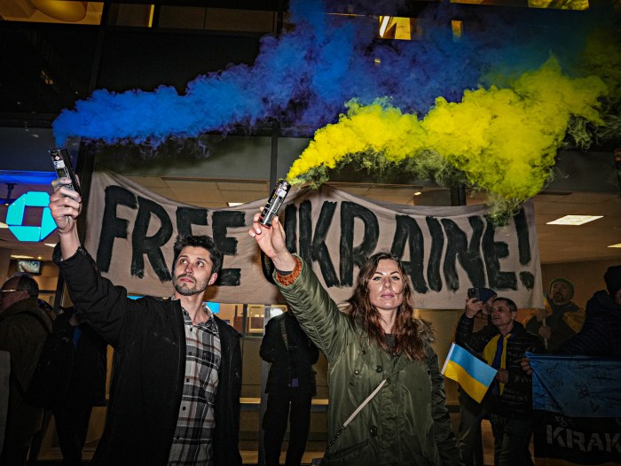 A group of protesters called on their community to continue their support for Ukraine following President Trump's decision to remove military aid.