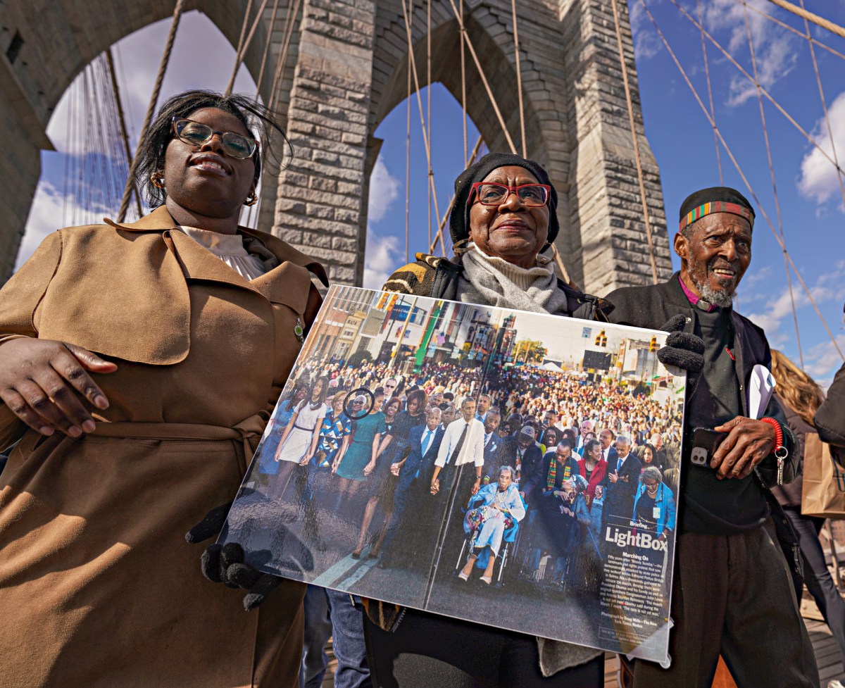 Civil rights marchers from Selma walk across Brooklyn Bridge