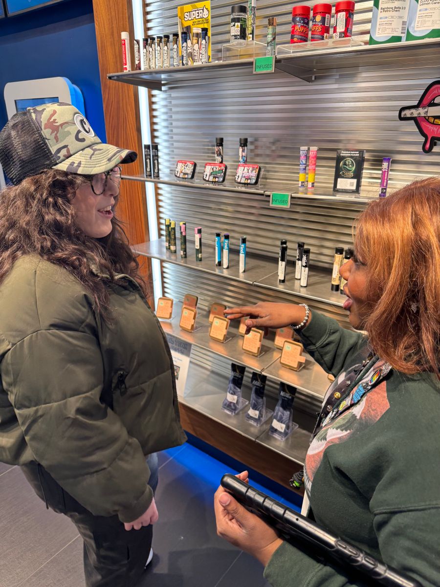 Ariella Vaakil chats with an employee at Culture House, a Midtown cannabis dispensary.