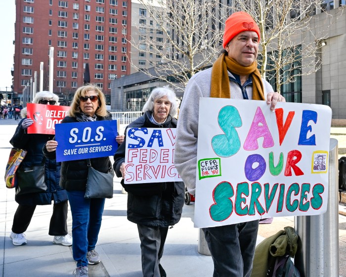 Federal workers and allies protested outside the Jacob K. Javits Federal Building against the massive DOGE firings. Photo by Gabriele Holtermann