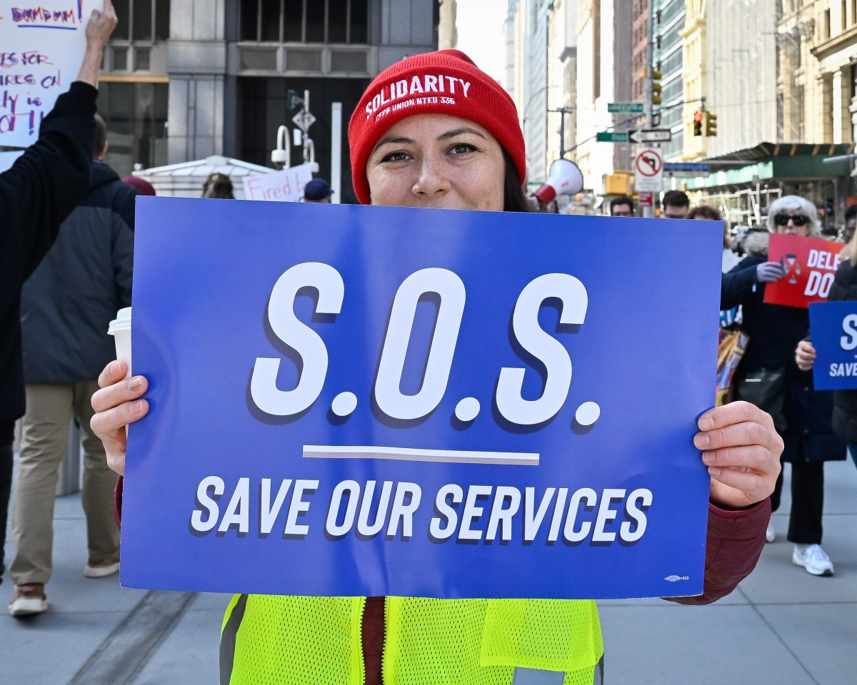 Federal workers and allies protested outside the Jacob K. Javits Federal Building against the massive DOGE firings. Photo by Gabriele Holtermann