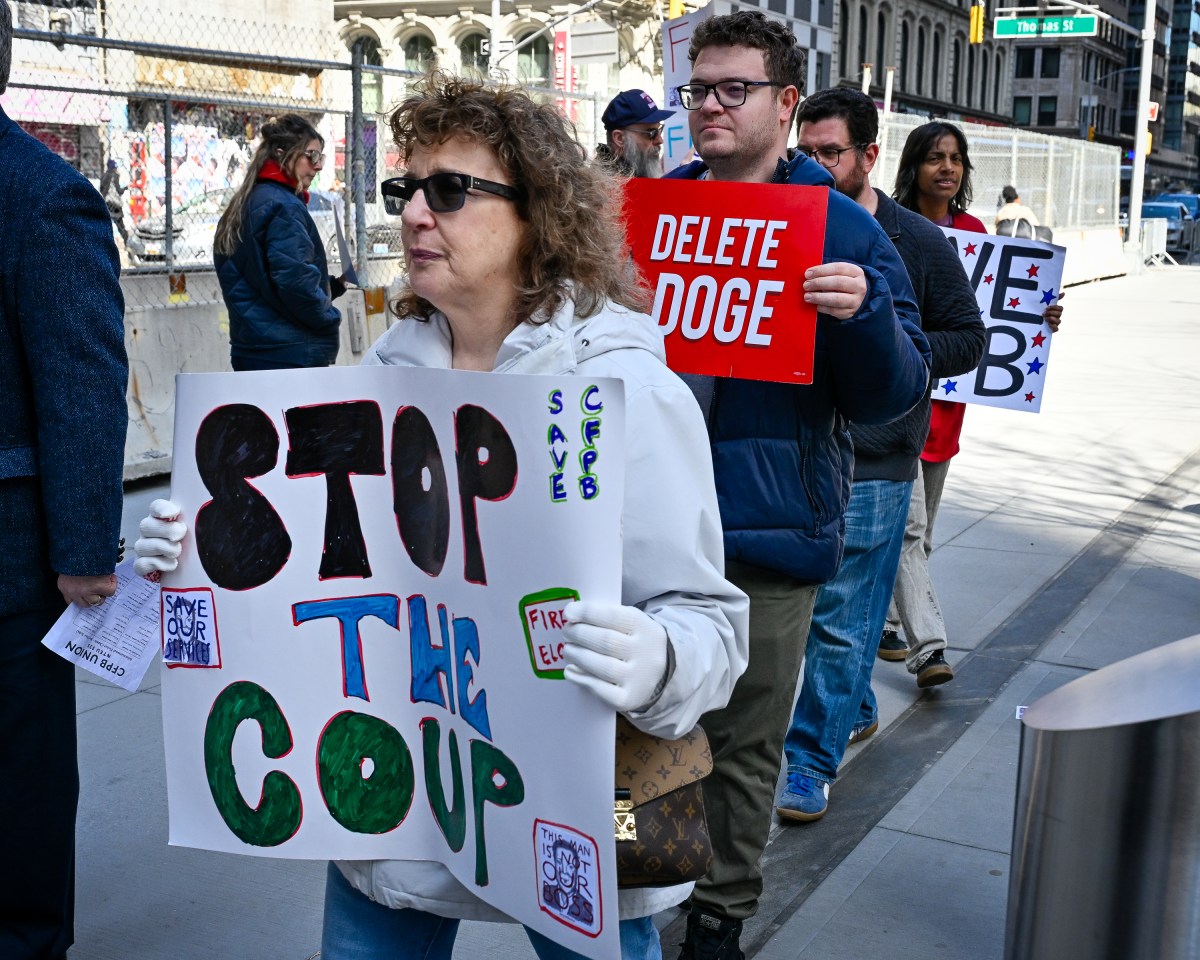 Federal workers and allies protested outside the Jacob K. Javits Federal Building against the massive DOGE firings. Photo by Gabriele Holtermann