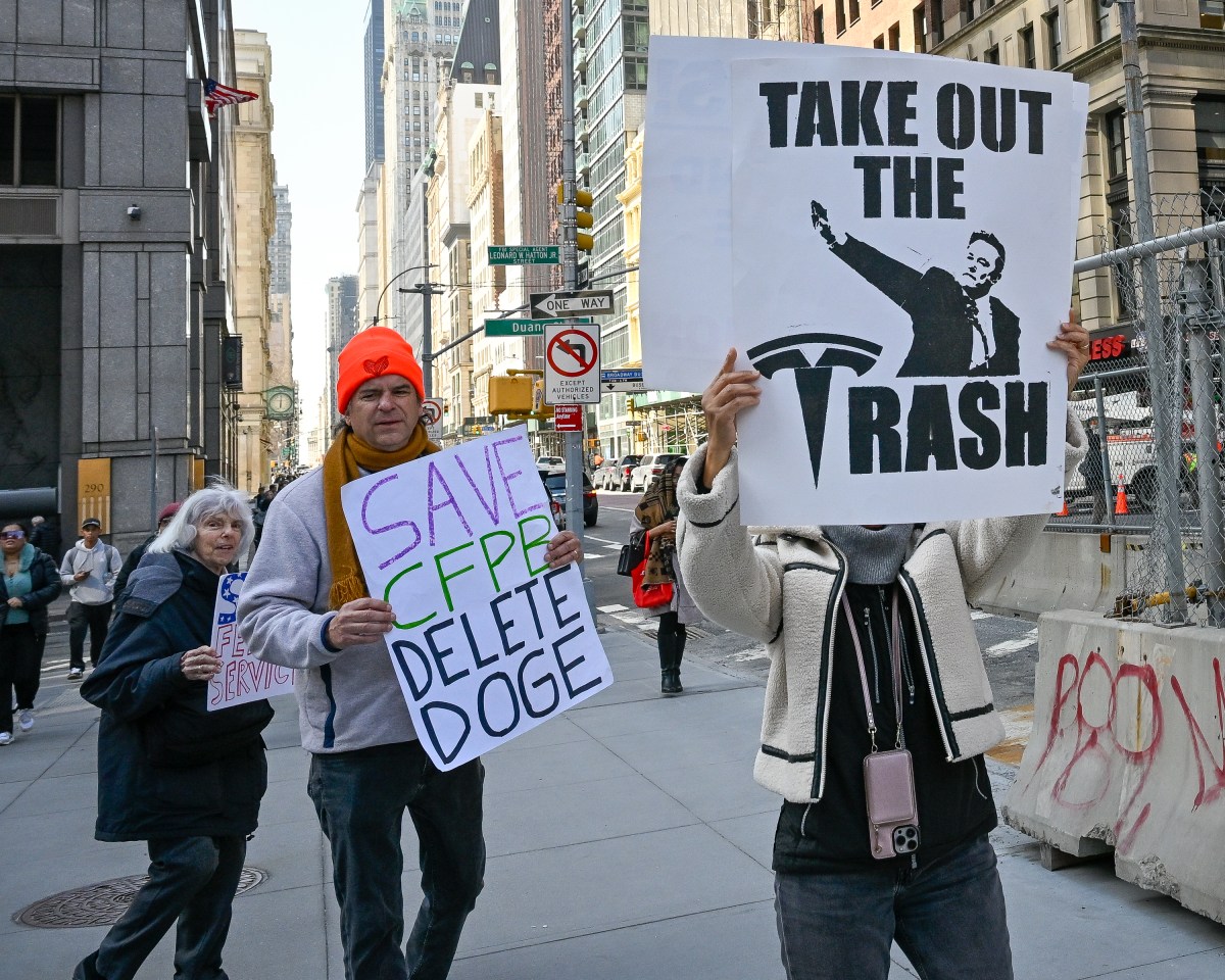 Federal workers and allies protested outside the Jacob K. Javits Federal Building against the massive DOGE firings. Photo by Gabriele Holtermann