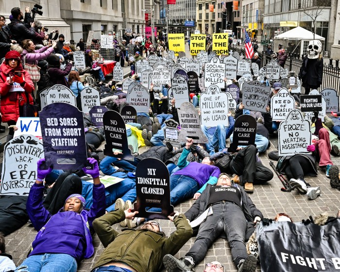 Protesters in Manhattan stage a die-in against Musk and Trump federal cuts