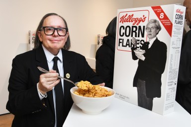 Bobby Grossman holding box of Corn Flakes with Andy Warhol image