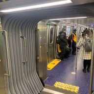 inside an open gangway train which is a walk-through train