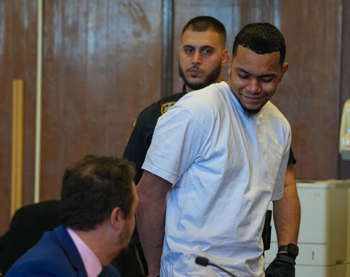 Migrant convicted in Times Square brawl smiles during sentencing